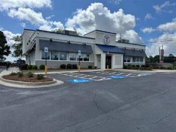 A photo of the exterior of the Peachtree Immediate Care location in Dublin on a sunny day.